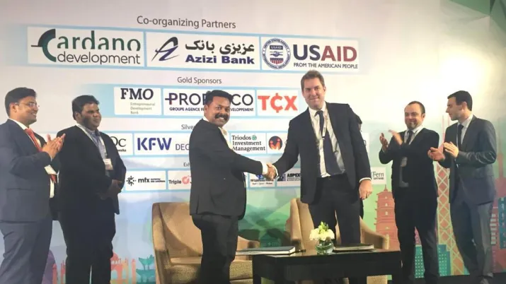 Thomas Eloy, Proparco’s Global Head of Lending Operations, and Dibyajyoti Pattanaik, Director of Annapurna, sign an agreement for a USD 15 million credit line, during Afiforum 2020